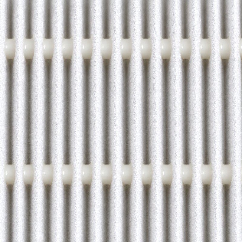 Close-up of pleat separators keeping the pleats open and evenly spaced